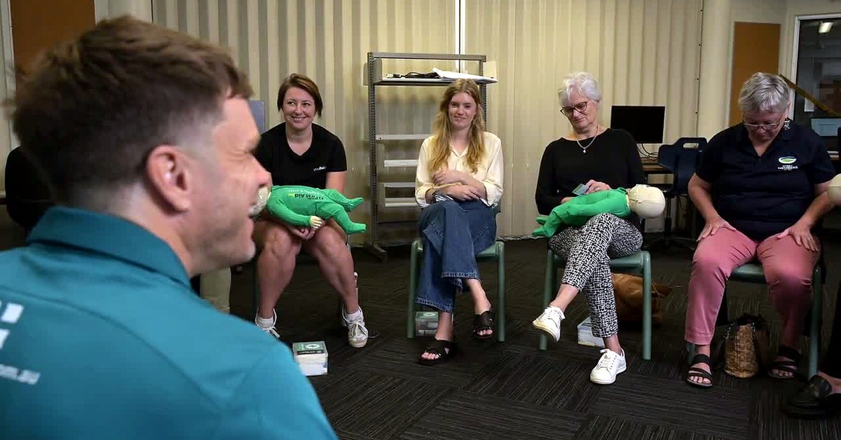 Smiling participants during a Team First Aid X-press training session